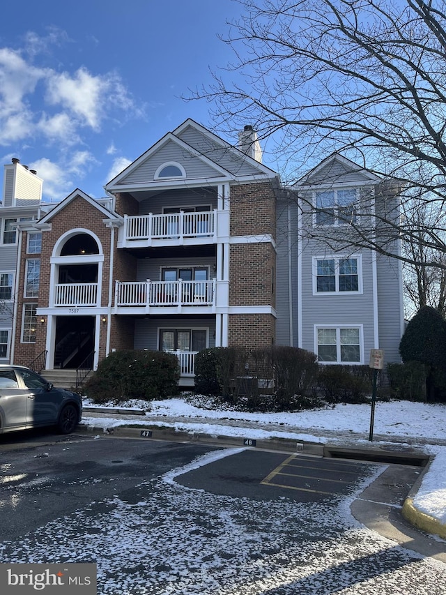 view of snow covered property