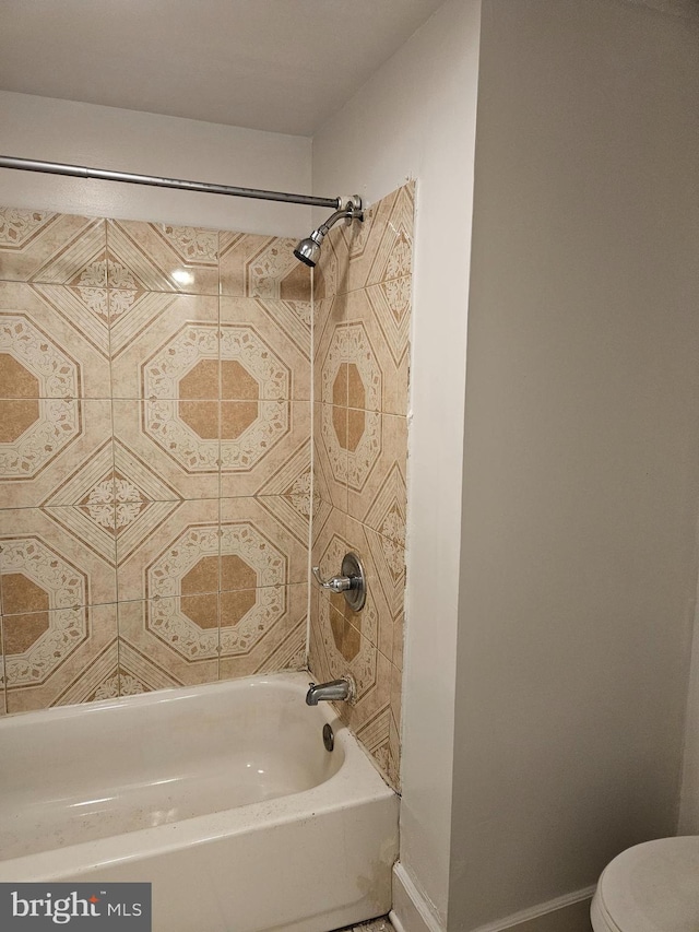 bathroom with  shower combination and toilet