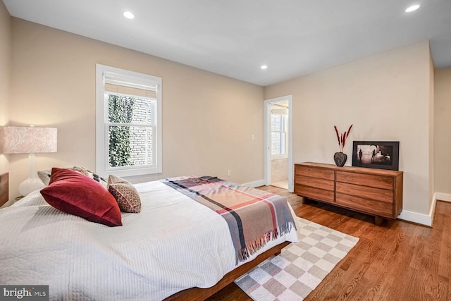 bedroom featuring hardwood / wood-style flooring