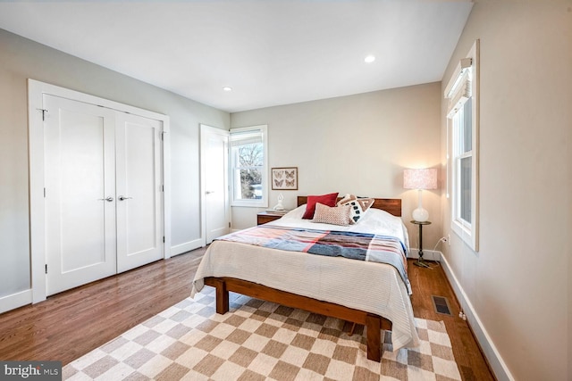 bedroom featuring light hardwood / wood-style flooring