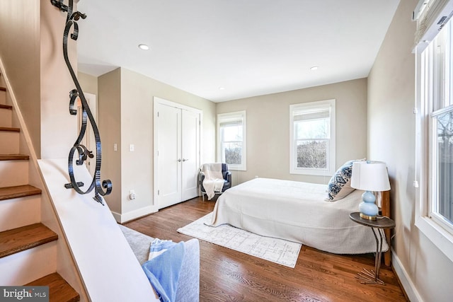 bedroom featuring dark hardwood / wood-style flooring