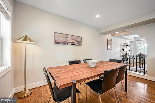 dining area with hardwood / wood-style floors