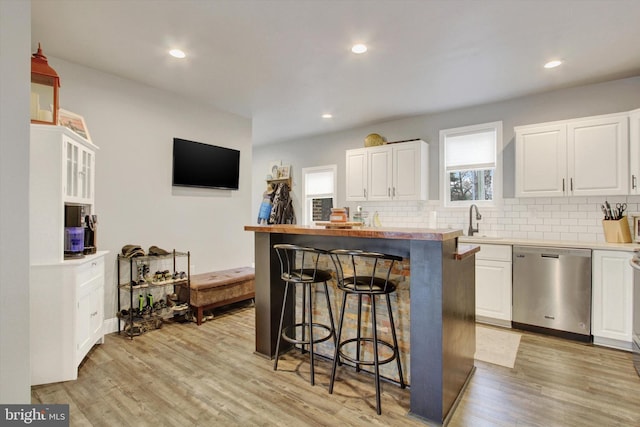 480 Natural Dam Rd, Gettysburg, PA 17325 - kitchen with dishwasher, a breakfast bar area, a sink, white cabinetry, and recessed lighting