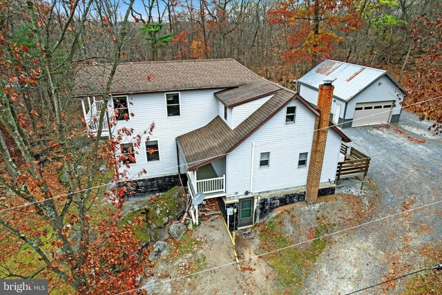 480 Natural Dam Rd, Gettysburg, PA 17325 - view of front of house with roof with shingles, a garage, and an outdoor structure