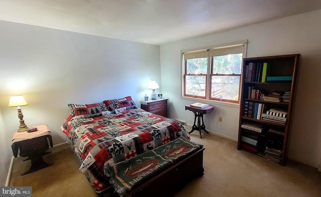 bedroom featuring light colored carpet