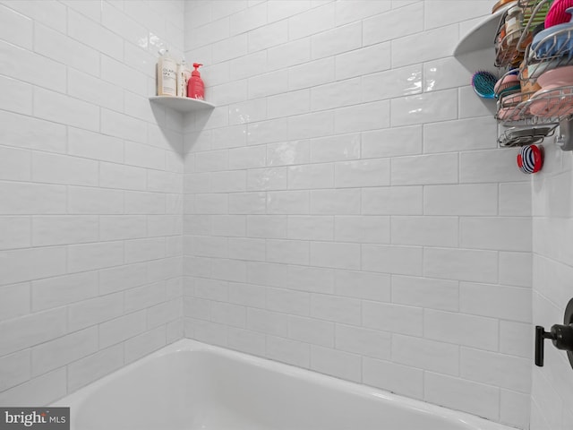 bathroom with a bathing tub