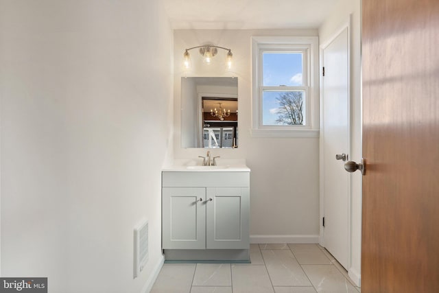 bathroom featuring tile patterned floors and vanity