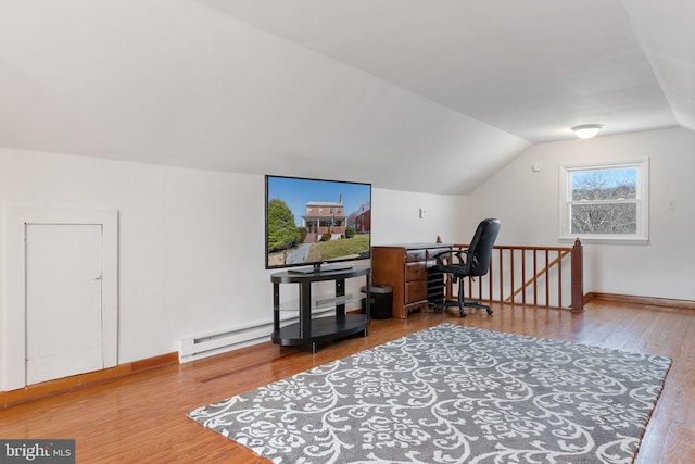 office space with lofted ceiling and wood-type flooring