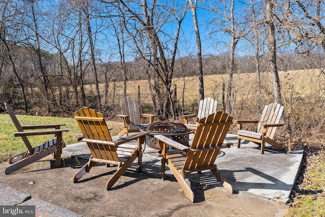 view of patio / terrace featuring a fire pit