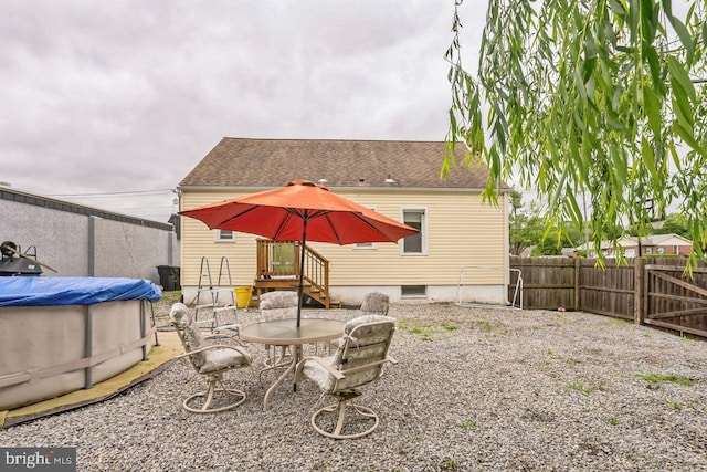 view of yard with a covered pool