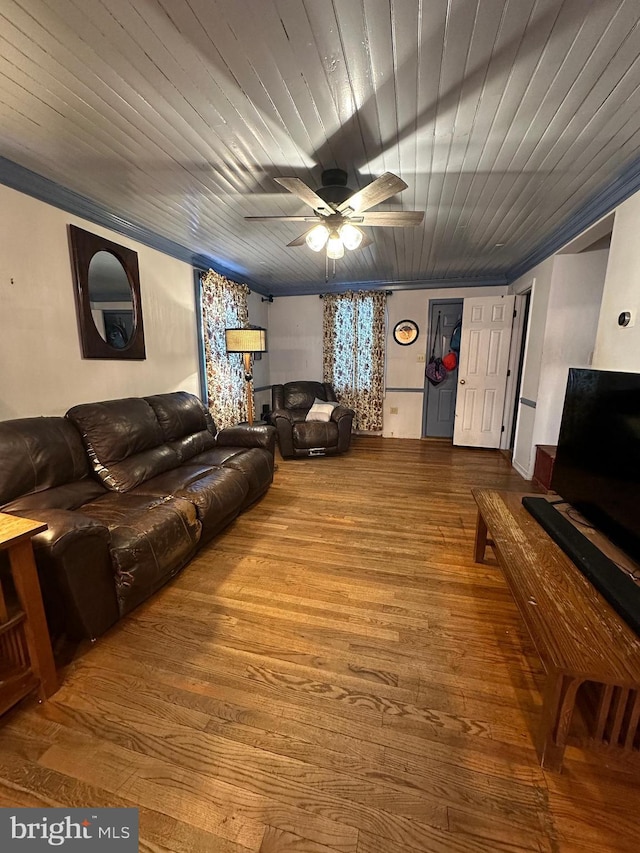 living room featuring wood-type flooring, wooden ceiling, and ceiling fan