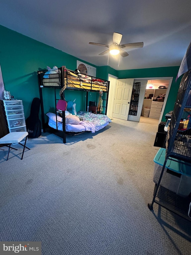 bedroom featuring carpet floors and ceiling fan