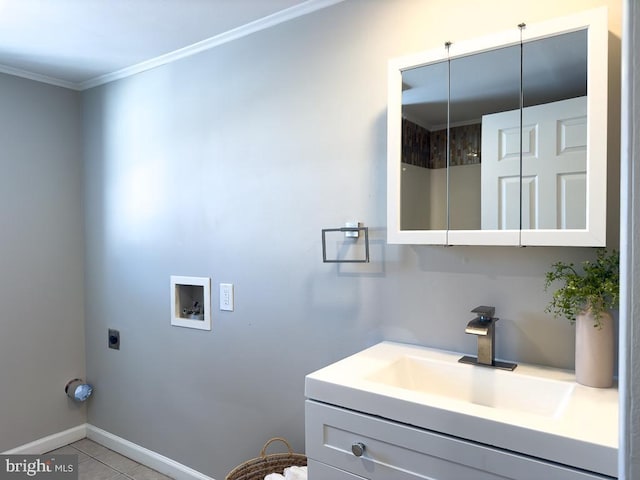 bathroom featuring tile patterned flooring, vanity, and crown molding