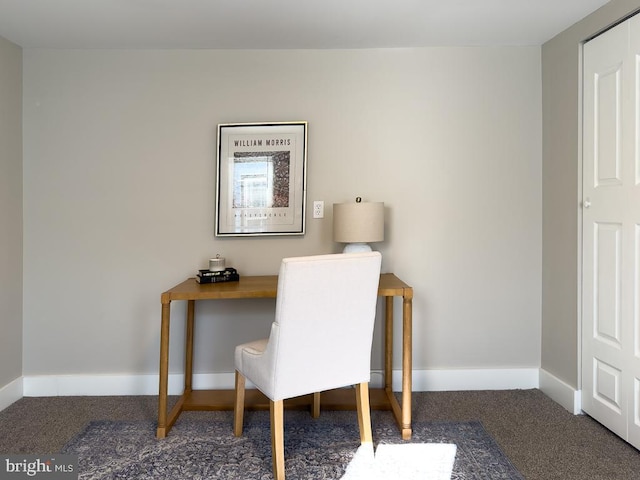 home office with dark colored carpet