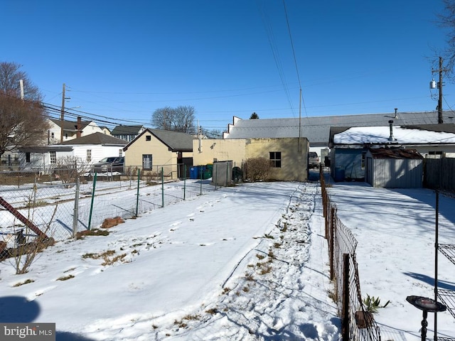 view of yard covered in snow