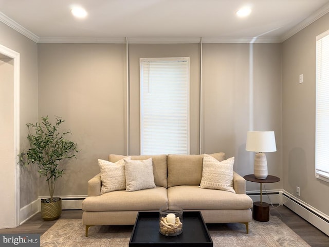 living room with ornamental molding, dark hardwood / wood-style flooring, and baseboard heating