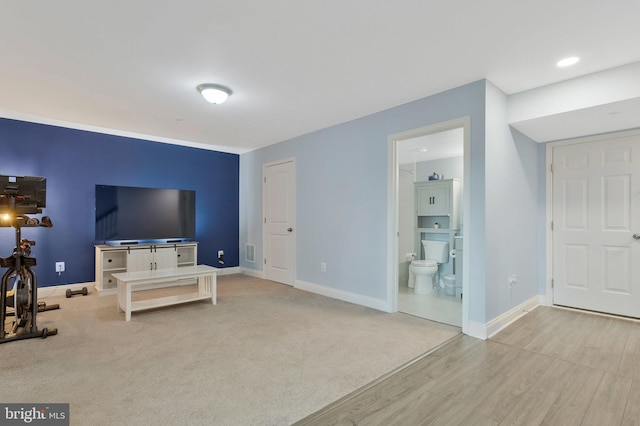 living room with light colored carpet