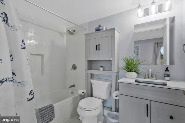 full bathroom with vanity, shower / bath combination with curtain, and toilet