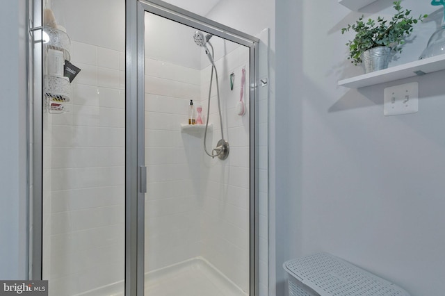 bathroom with an enclosed shower