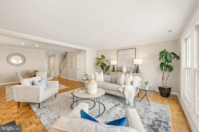 living room featuring light parquet floors and crown molding