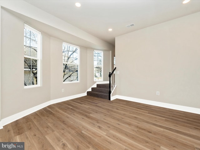 spare room featuring hardwood / wood-style flooring