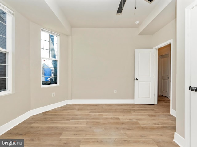 unfurnished room with ceiling fan and light hardwood / wood-style floors