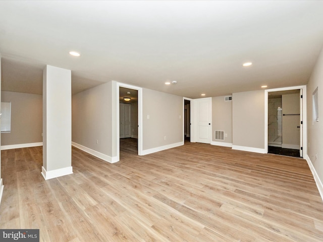 basement featuring light wood-type flooring