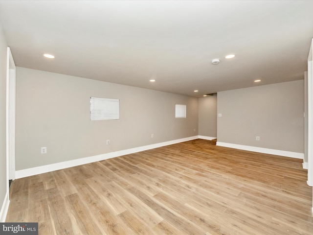 basement featuring light wood-type flooring