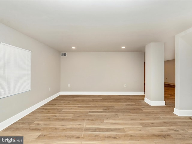 unfurnished room featuring light wood-type flooring