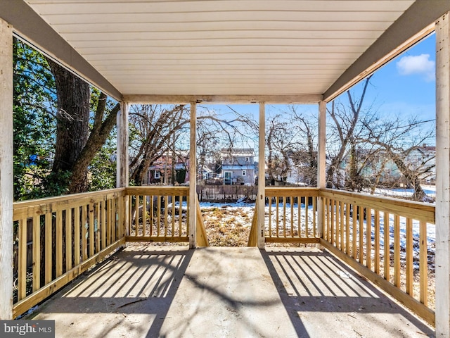 view of snow covered deck