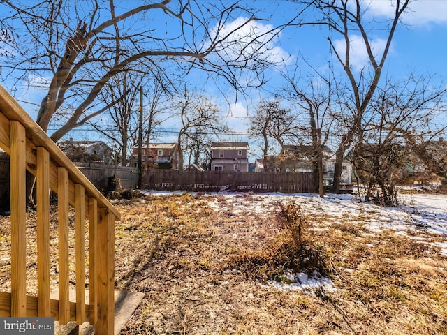 view of yard covered in snow