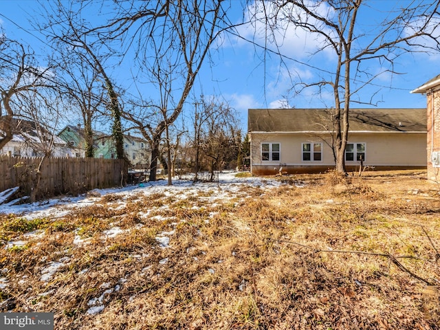 view of snow covered property