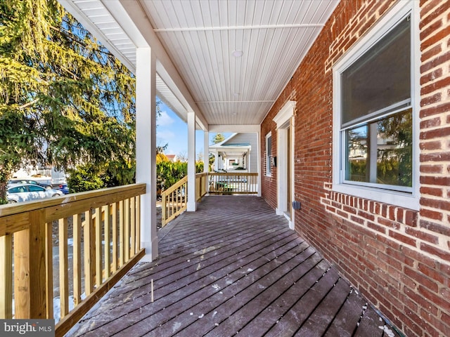 wooden deck with covered porch