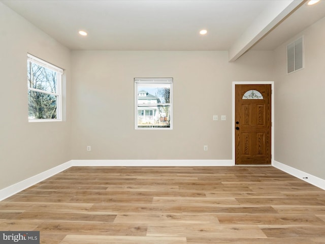 entrance foyer featuring light wood-type flooring