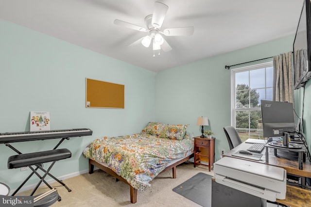 carpeted bedroom with ceiling fan