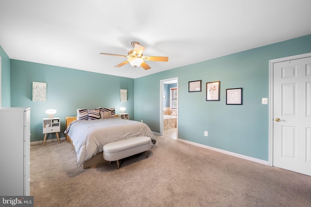 bedroom with connected bathroom, ceiling fan, and carpet