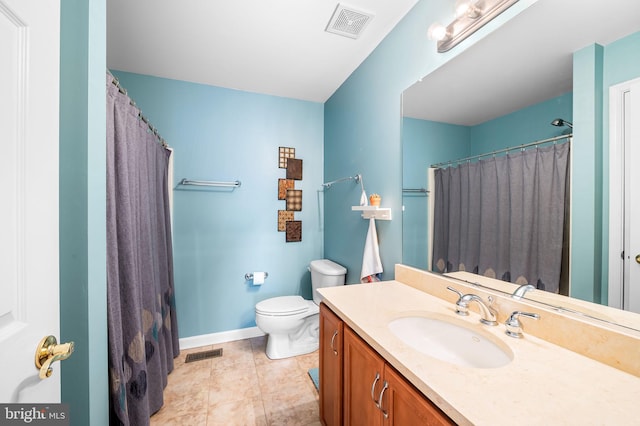 bathroom with vanity, toilet, and a shower with shower curtain