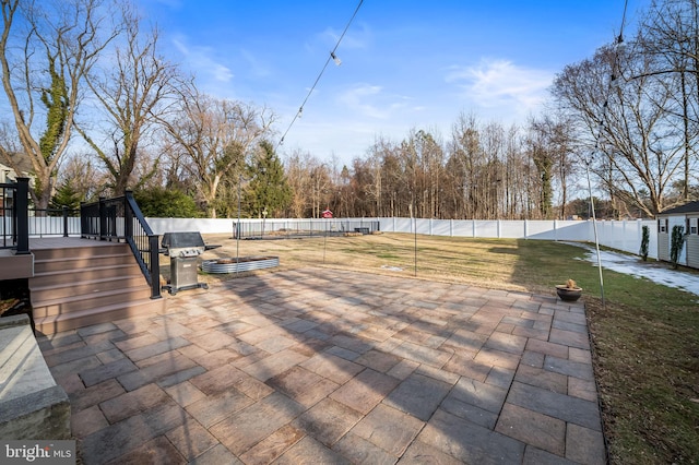 view of patio featuring a wooden deck