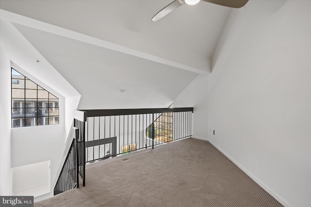 additional living space with lofted ceiling, carpet floors, and ceiling fan