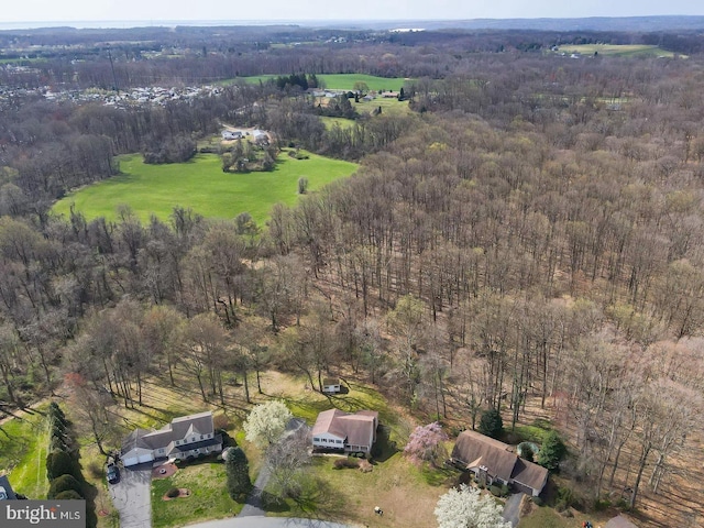 birds eye view of property featuring a rural view