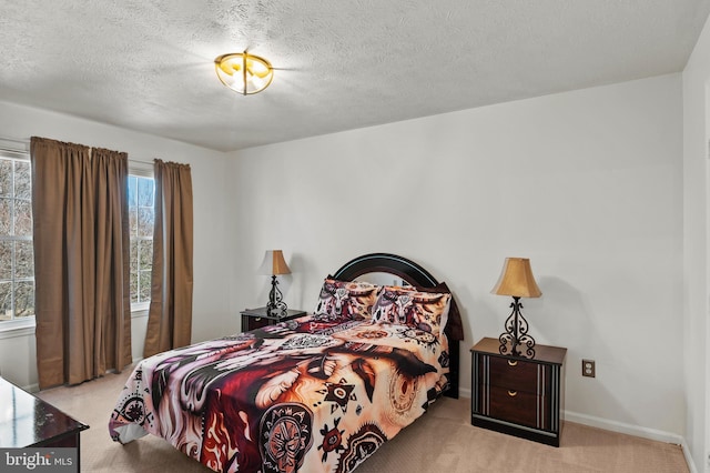 carpeted bedroom with a textured ceiling