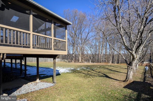 view of yard featuring a sunroom