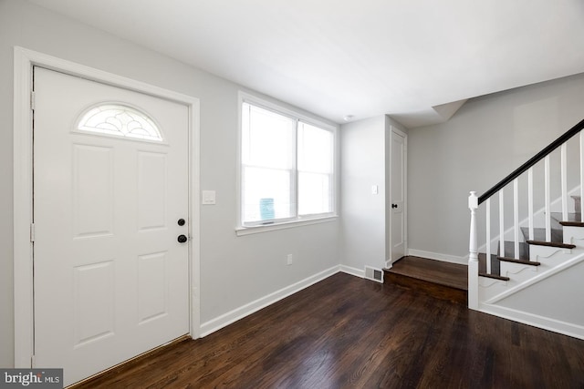 entrance foyer featuring dark wood-type flooring