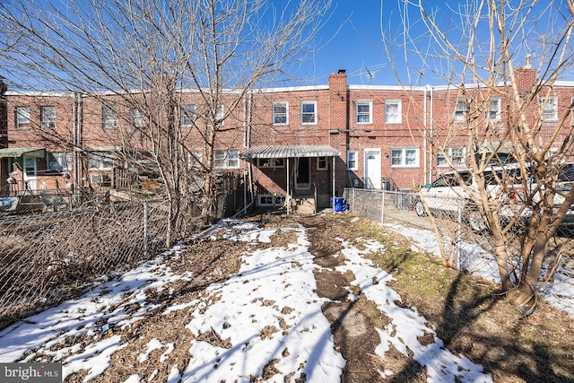 view of snow covered property