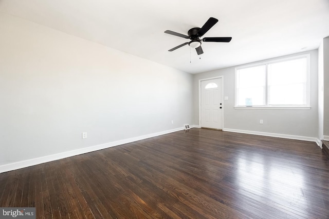 interior space featuring ceiling fan and dark hardwood / wood-style flooring