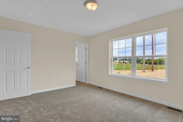 view of carpeted spare room