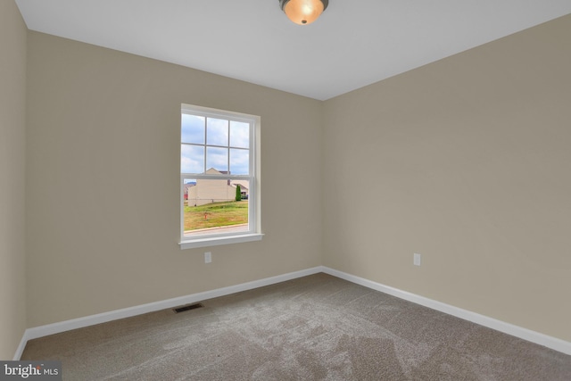 unfurnished room with carpet