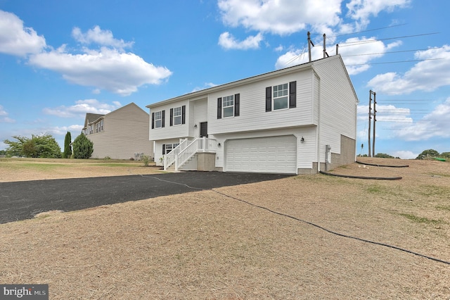 raised ranch with a garage