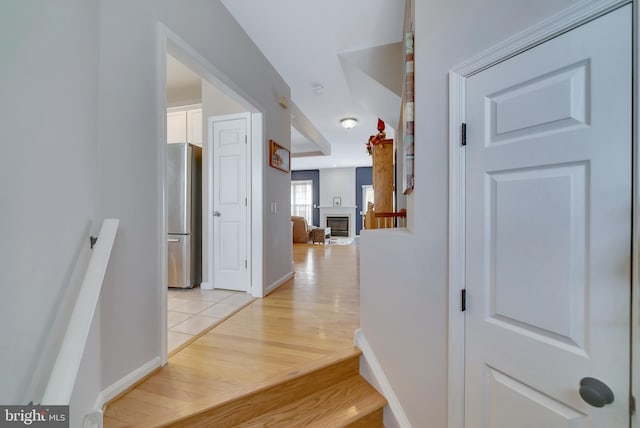 hallway with light wood-type flooring