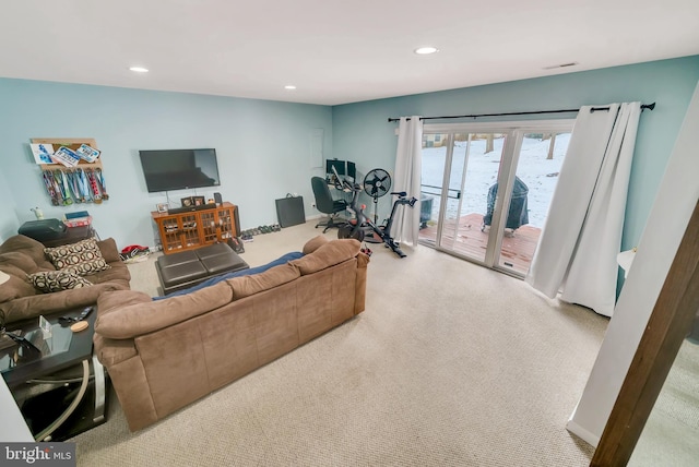 living room featuring light colored carpet